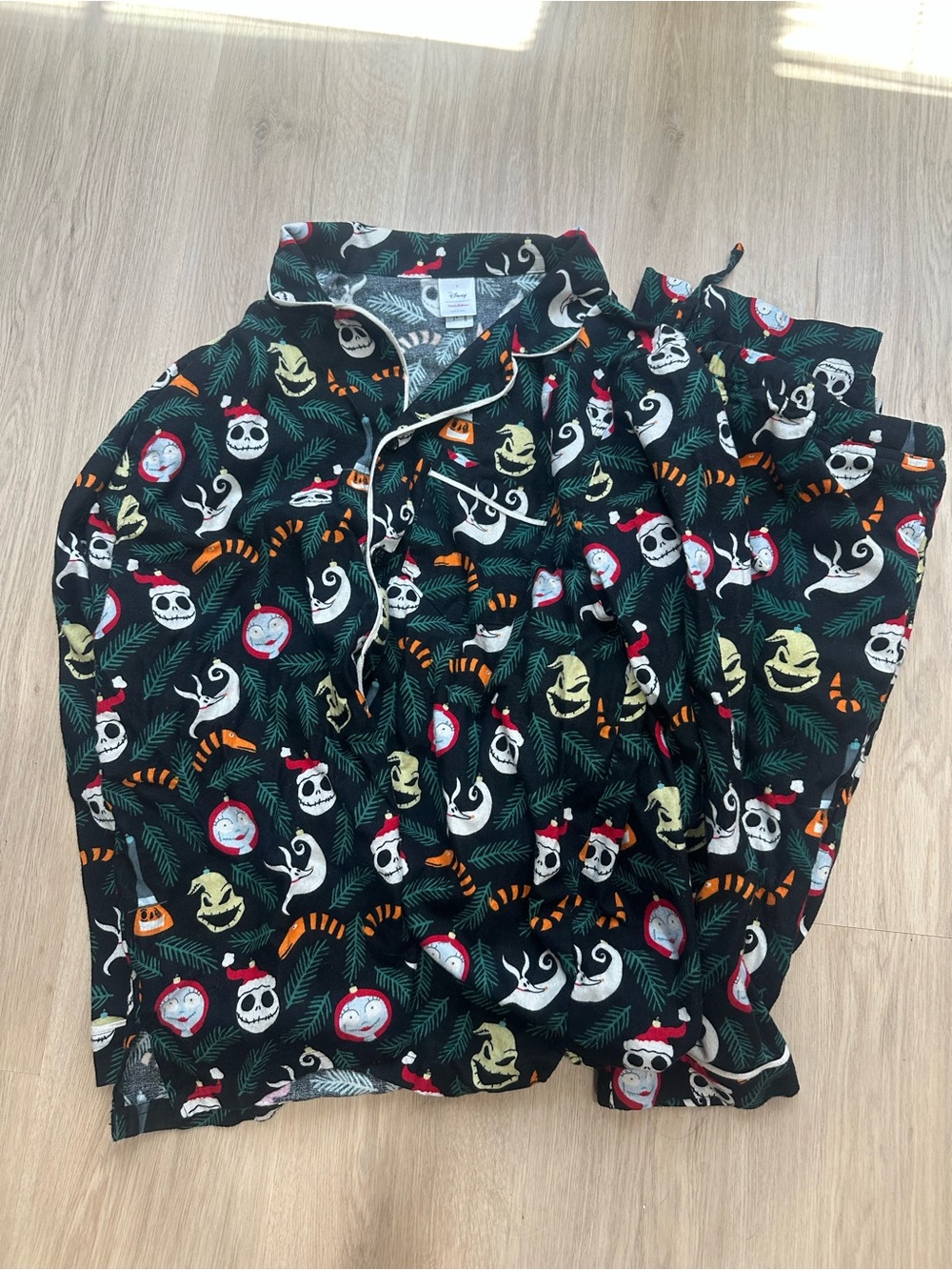 Women’s Disney Black Holiday Character Pajama set with Green and Orange Accents